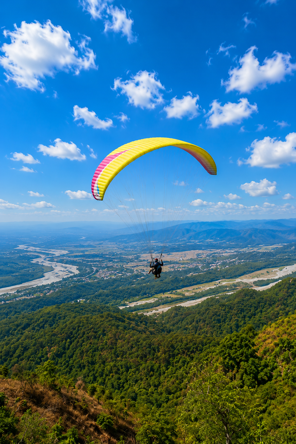 Paraglider flying over Kotabagh Valley